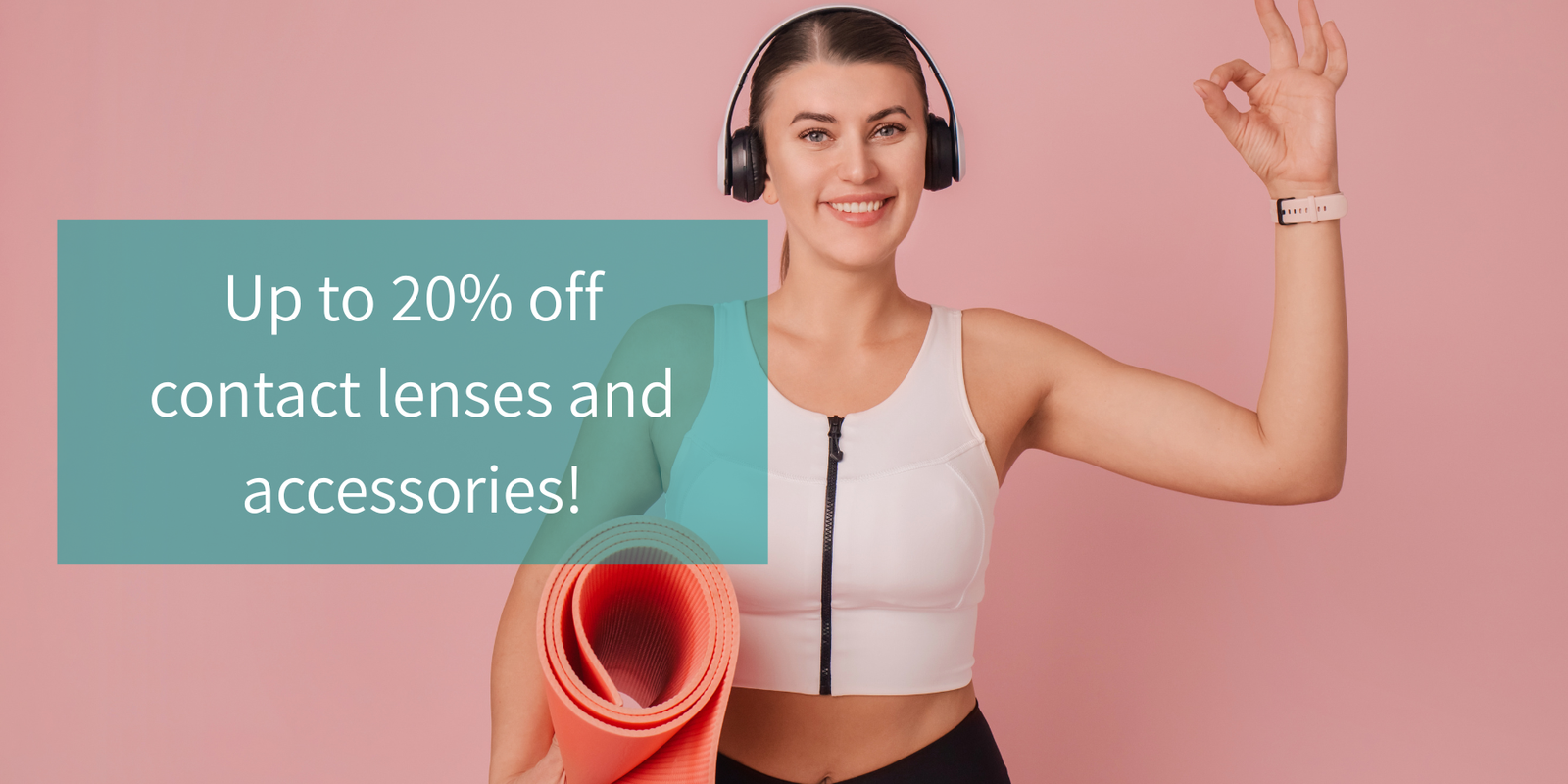 A smiling woman wearing black over-ear headphones and a white sports tank top stands against a pink background, holding a rolled pink exercise mat. A teal promotional text box reads 'Up to 20% off contact lenses and accessories!'.